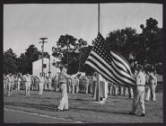 Photograph of Air Force ROTC cadets raising/lowering the American flag